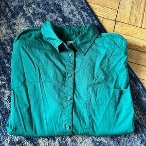 Emerald long-sleeved button down top.